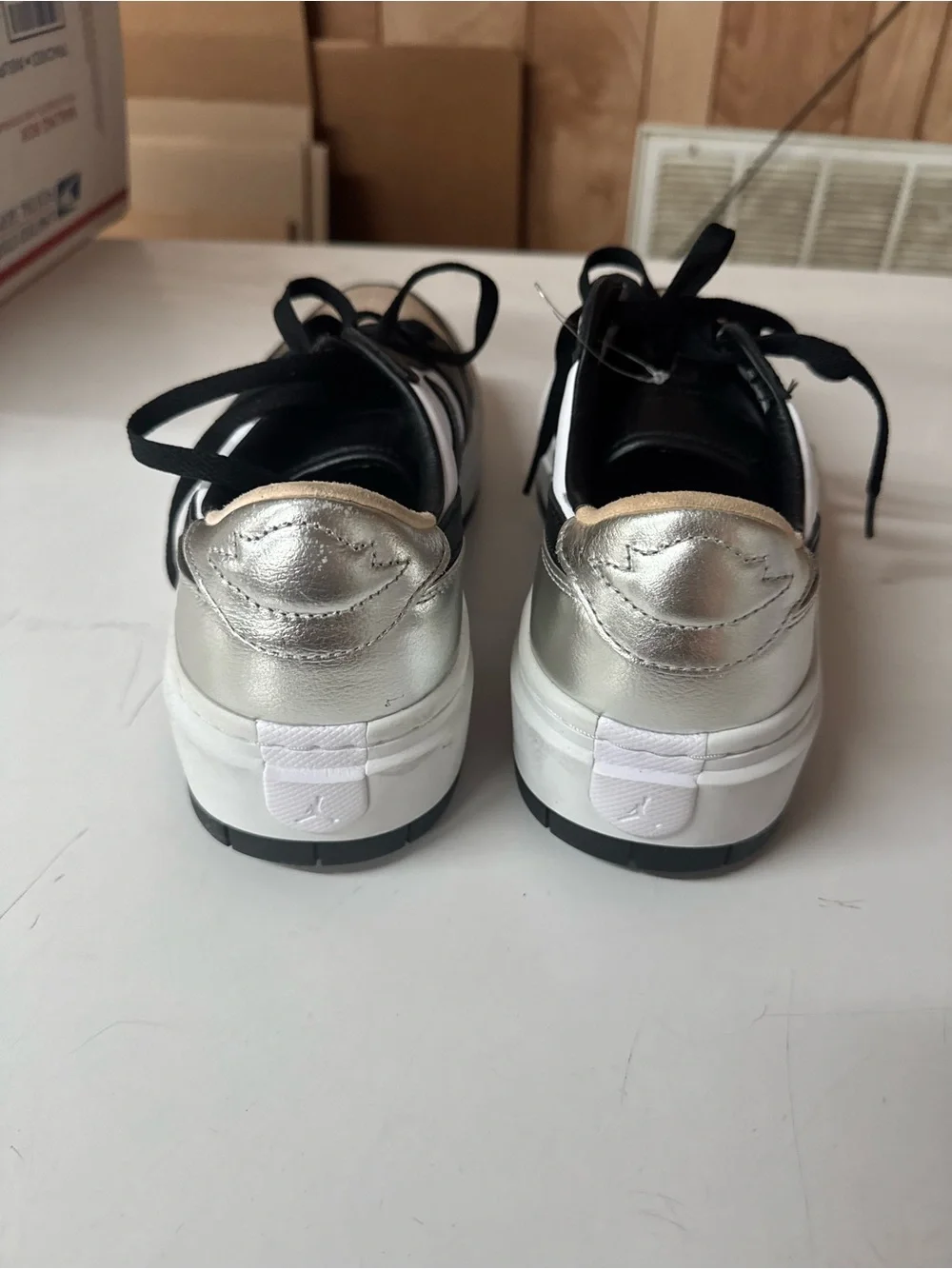 Jordan Low-Top Sneakers in Black, White & Silver